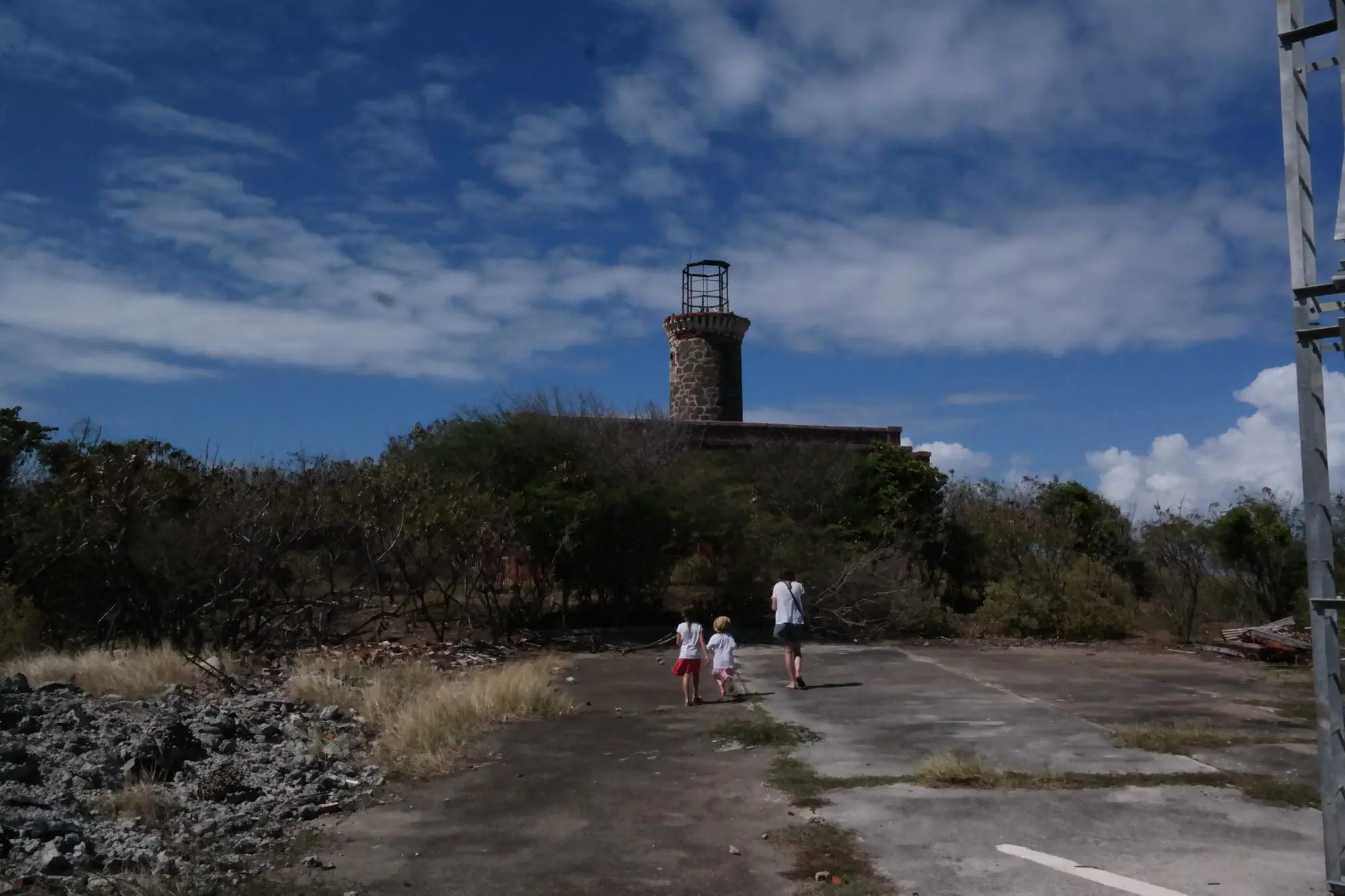 Visitors walking up to the Culebrita lighthouse on its hilltop