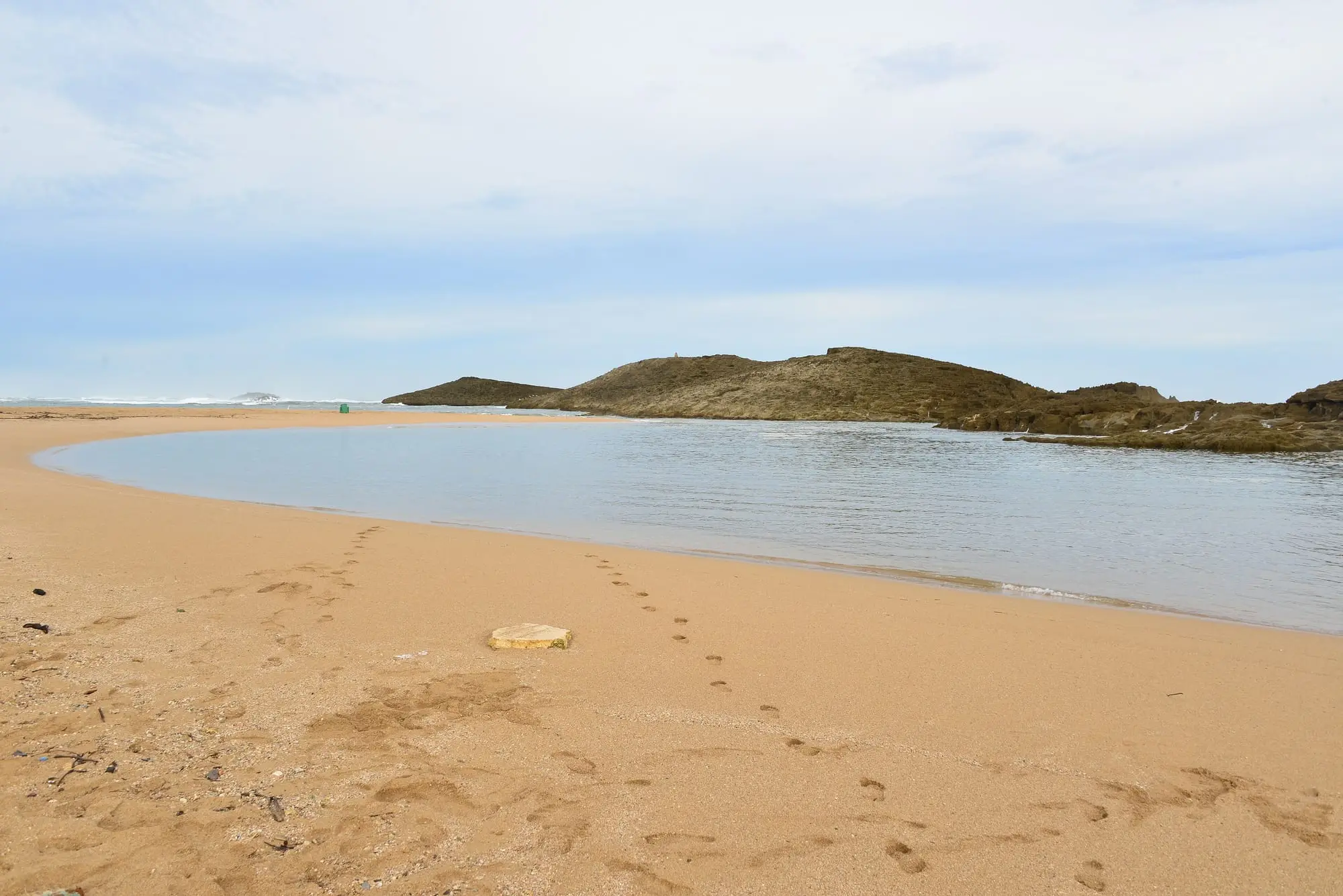 Puerto Nuevo beach in Vega Baja: golden sand and a calm lagoon sheltered by a long rocky reef